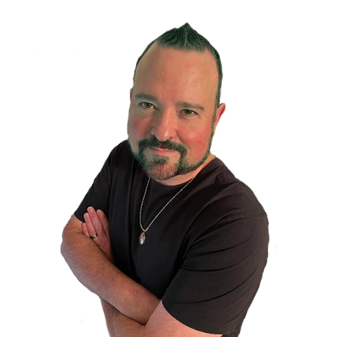 Man with beard wearing a black shirt.