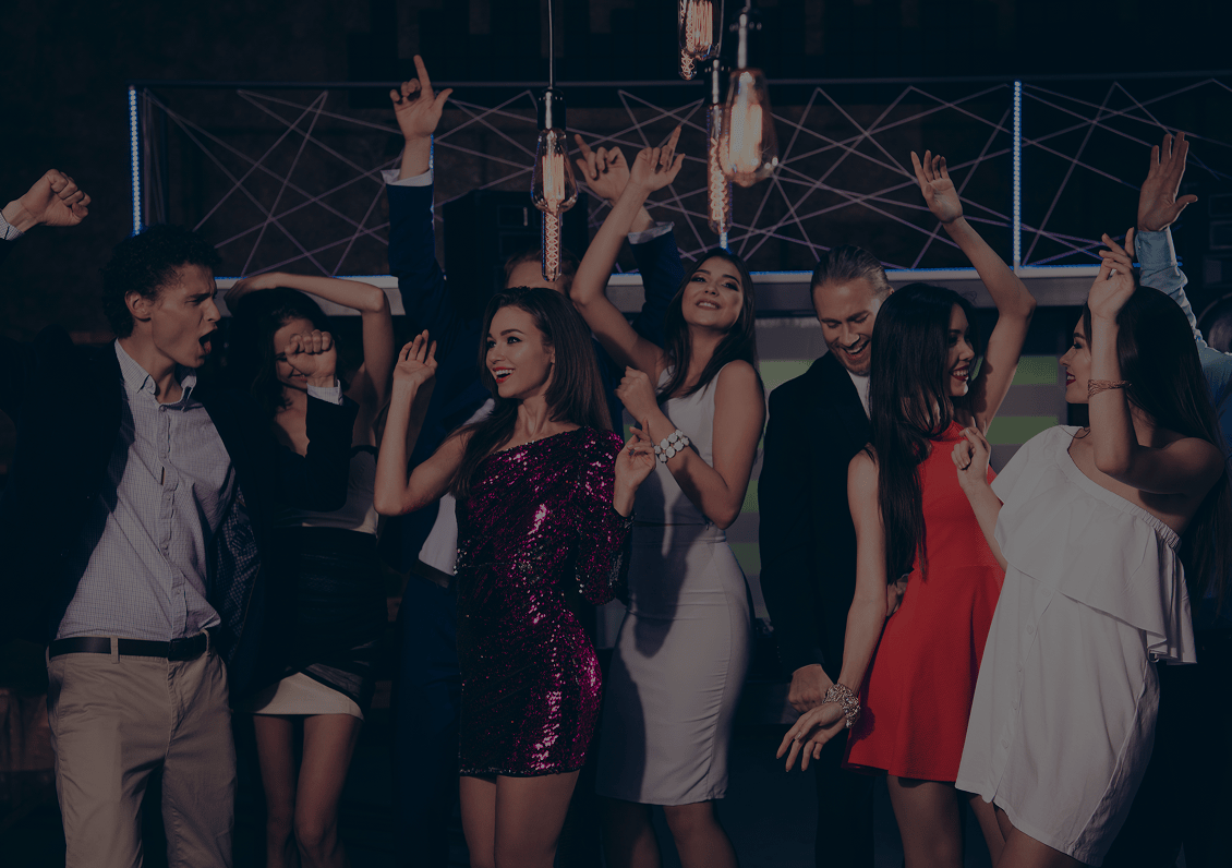 People dancing at a lively party.